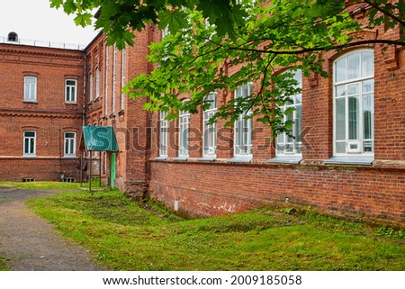 A stone or brick old house in Russian city. An old building