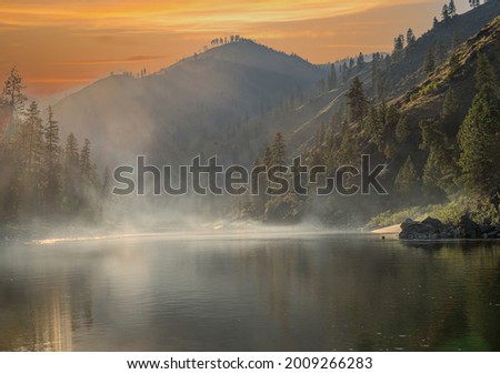 Sunset over the mountains and the salmon river in the  Frank Church River of no Return wilderness area in northern Idaho USA Royalty-Free Stock Photo #2009266283