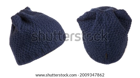  set of two knitted dark blue  beanie  isolated on white background .