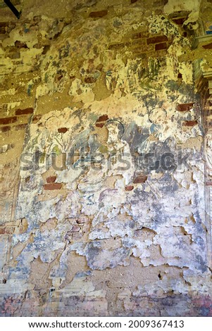 the remains of paintings on the walls of a destroyed Orthodox church, Russia, the village of Ryapolovo, built in 1791 currently the temple is abandoned