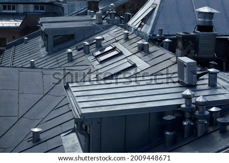 Architectural detail of metal roofing on commercial construction of modern building complex. High quality photo