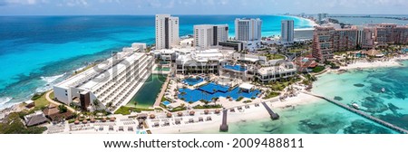 Aerial view of Punta Norte beach, Cancun, México. Beautiful beach area with luxury hotels near the Caribbean sea in Cancun, Mexico.