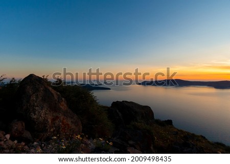 Morning sunrise scenery at Santorini, Greece, Santorini is one of the Cyclades islands in the Aegean Sea, The whitewashed, cubiform houses of its 2 principal towns Royalty-Free Stock Photo #2009498435