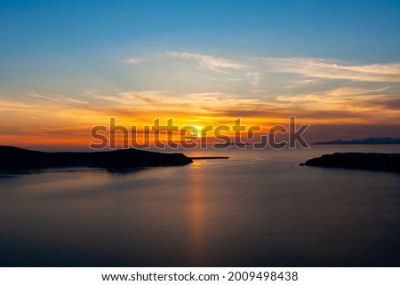Morning sunrise scenery at Santorini, Greece, Santorini is one of the Cyclades islands in the Aegean Sea, The whitewashed, cubiform houses of its 2 principal towns Royalty-Free Stock Photo #2009498438