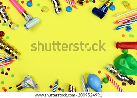 Birthday holiday background, decor on a yellow background. A festive mockup.