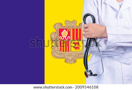 Female doctor with stethoscope in hand on the background of the Andorra flag. Concept medicine, pandemic in the country
