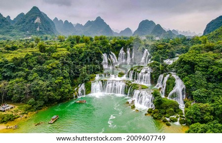 Aerial view of “ Ban Gioc “ waterfall, Cao Bang, Vietnam. “ Ban Gioc “ waterfall is one of the top 10 waterfalls in the world. Royalty-Free Stock Photo #2009607749