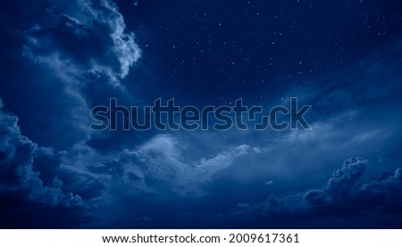 Night sky in the clouds with many stars