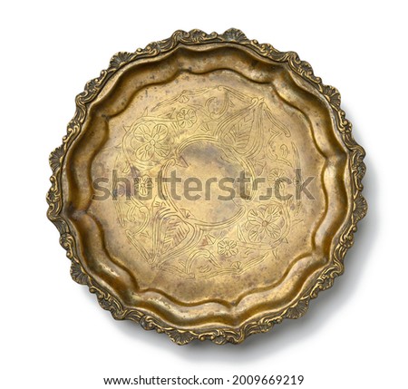 empty copper round vintage plate isolated on white background, fruit dish. View from above Royalty-Free Stock Photo #2009669219