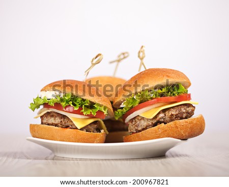 Fresh mini burger served meal on table
