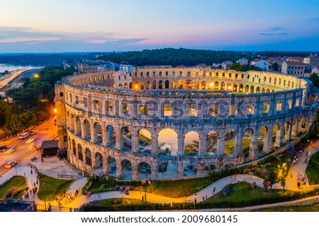 Sunset aerial view of Roman amphitheatre in Pula, Croatia Royalty-Free Stock Photo #2009680145
