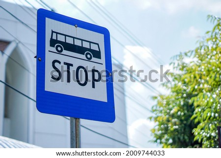 blue rectangular bus stop signs, bus stop signs at Indonesian bus stops