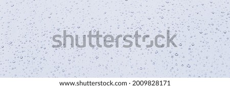 rain water drops on blue background