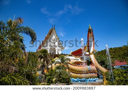 Wat Khao Sung Chaem Fa temple with giant snake and reclining gold buddha, in Kanchanaburi, Thailand Royalty-Free Stock Photo #2009883887