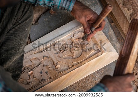 Wood carved furniture in India Royalty-Free Stock Photo #2009932565