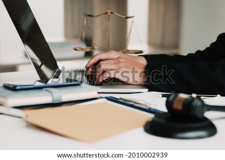 justice and law concept. Close-up Of male lawyer working in office. Legal law, advice and justice concept.	
