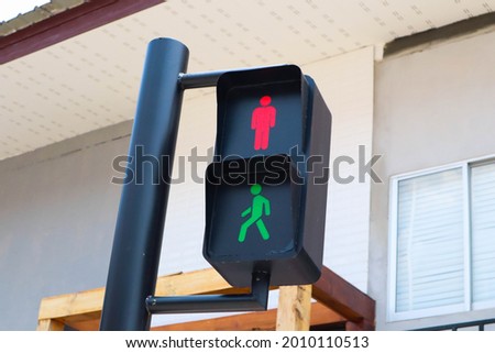 Red and Green light of pedestrian traffic light.