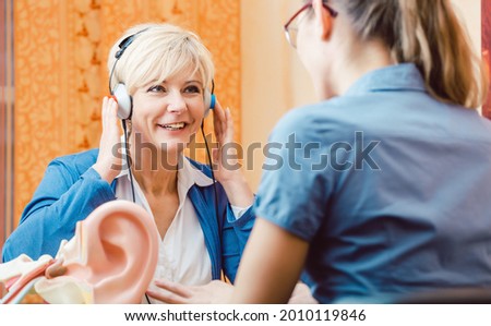 Deaf woman takes a hearing test