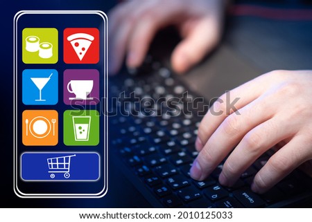 Development of online store app. Creation of a website for  online store. Programmer makes applications for online trading. Programmer hands on keyboard. He is working on interface of trading app