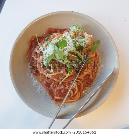 Tomato pasta in meat sauce. A picture of delicious pasta.