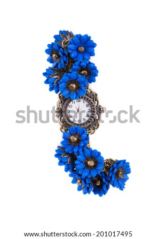 Handmade watch with blue flowers. Isolated on a white background.