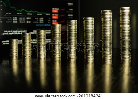 Ladder coin pattern from left to right, business growth, stock trading concept.