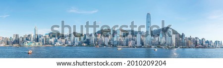 Panorama of skyline of Victoria Harbor in Hong Kong city Royalty-Free Stock Photo #2010209204
