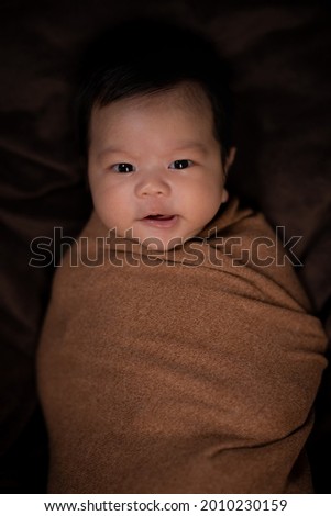New born asian kid was take photo in studio