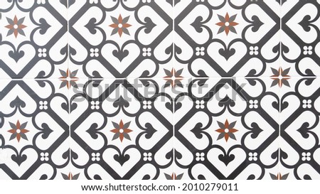 Seamless pattern repeat floral Azulejo patchwork mosaic tile wallpaper vintage retro background  Royalty-Free Stock Photo #2010279011