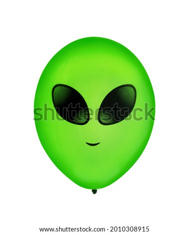 Green air flying balloon with alien smile isolated on white background