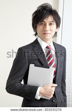 Man with a Tablet PC