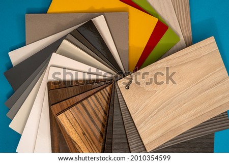 Sample catalog of vinyl floor or furniture for design isolated on blue background 
