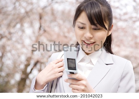 Woman looking at the mobile phone
