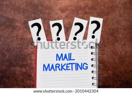 Hand writing sign Mail Marketing. Word Written on sending a commercial message to build a relationship with a buyer Brainstorming The New Idea Of Solutions And Answers Seeking More Clues
