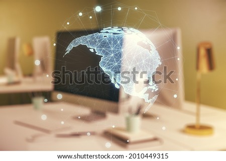 Digital America map on modern laptop background, international trading concept. Multiexposure