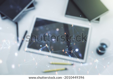 Creative abstract technology sketch and modern digital tablet on background, future technology and AI concept. Double exposure
