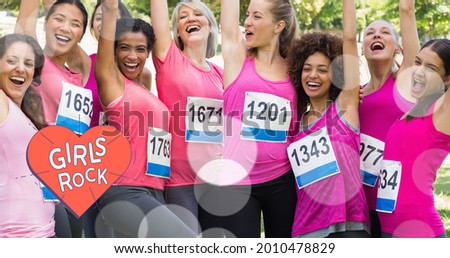 Composition of girl power text over group of women smiling. girl power, positive female strength and independence concept digitally generated image.