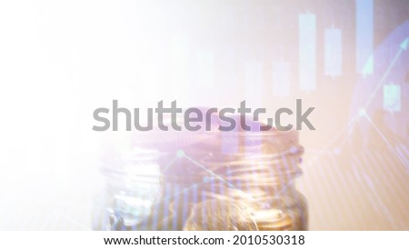 Blur Double exposure of light and stack of coins for finance and banking concept, coins stacked background, copy space for texting, blurred background.