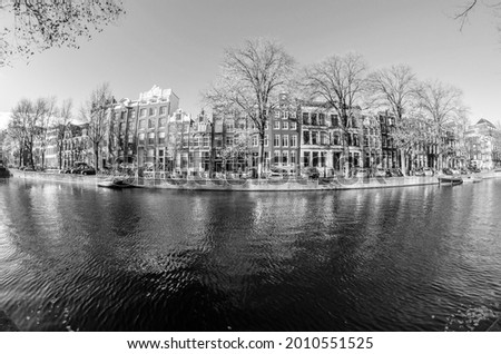 Urban landscape in Amsterdam, the Netherlands. Fish eye view, black and white image