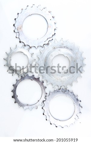 Metal cogwheels isolated on white