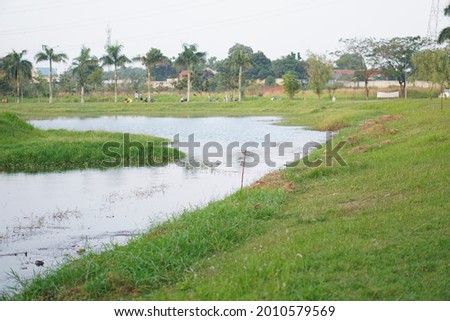 Small lake in Bekasi near Jakarta, located in the middle of modern neighborhood.