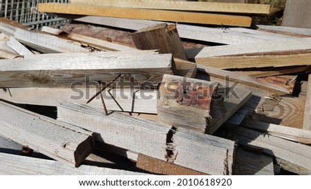 Universal Picture background nature with tree wood beams and stack of brown in summer with boards