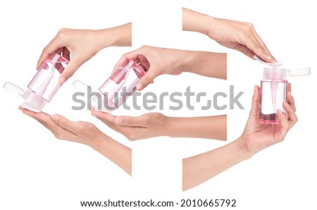 Collection of hand holding Makeup Remover Cleansing Water isolated on white background.