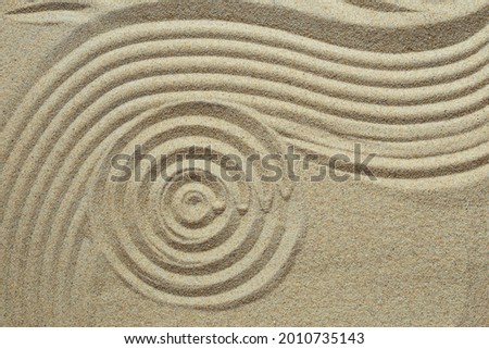 Zen pattern in brown sand