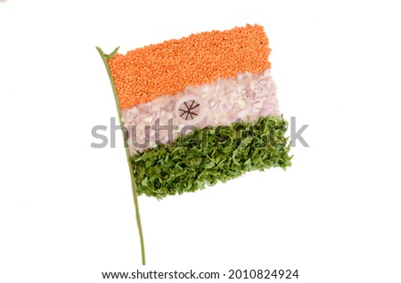 An Indian flag made of vegetable salad