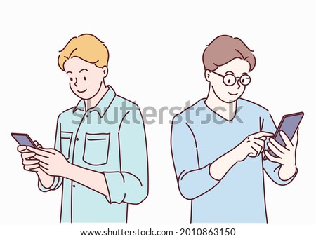 Young man using smartphone. He is chatting through social media. Hand drawn in thin line style, vector illustrations.