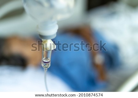 The blur of the sick patient get treatment on the bed inside the hospital elegant beautiful. picture for background. Hospital concept.