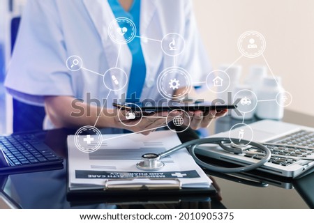 medical technology concept,smart doctor hand working with modern laptop computer with his team virtual icon diagram