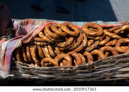 A basket of crusty Semites bagels Royalty-Free Stock Photo #2010917363