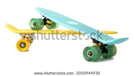 Colorful skateboards on white background